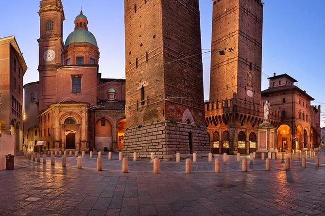 Bologna By Night Walking Tour - Stop 2: Piazza Santo Stefano, glowing lights and colored evenings