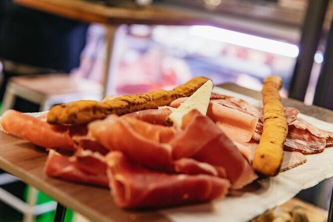 Bologna City Red Bus and Food tasting - Maps, Earphones, and Small-Group Comfort