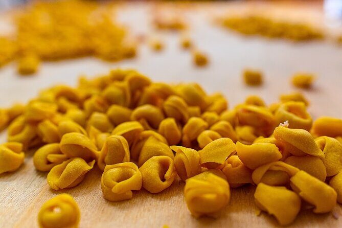 Bologna Food & Market Tour with 6 Tastings, Pasta, Wines & More - Wines, cold cuts, and the secret dish: where the meal really stacks up