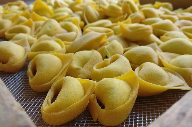 Bologna Food Tour from a local perspective - Piazza Maggiore stories: Neptune, the church, and the “why” behind what you see