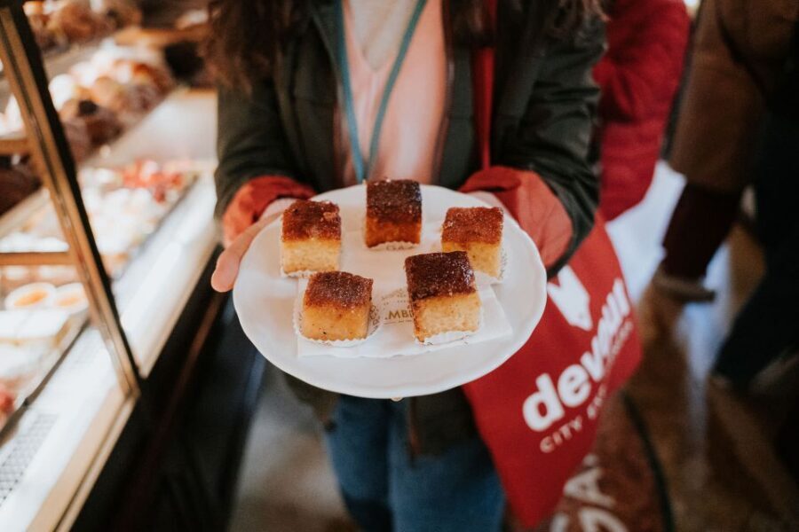 Bologna: Tastes and Traditions Food Tour with Market Visit - Mercato delle Erbe: cheese stalls, balsamic, and panini momentum