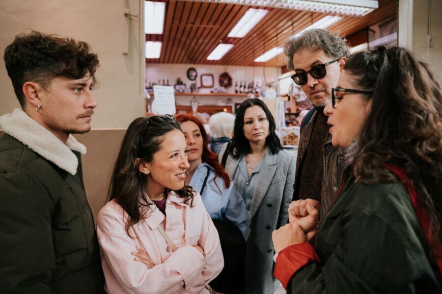 Bologna: Tastes and Traditions Food Tour with Market Visit - Fresh tomatoes, handmade pasta, and the indoor picnic moment