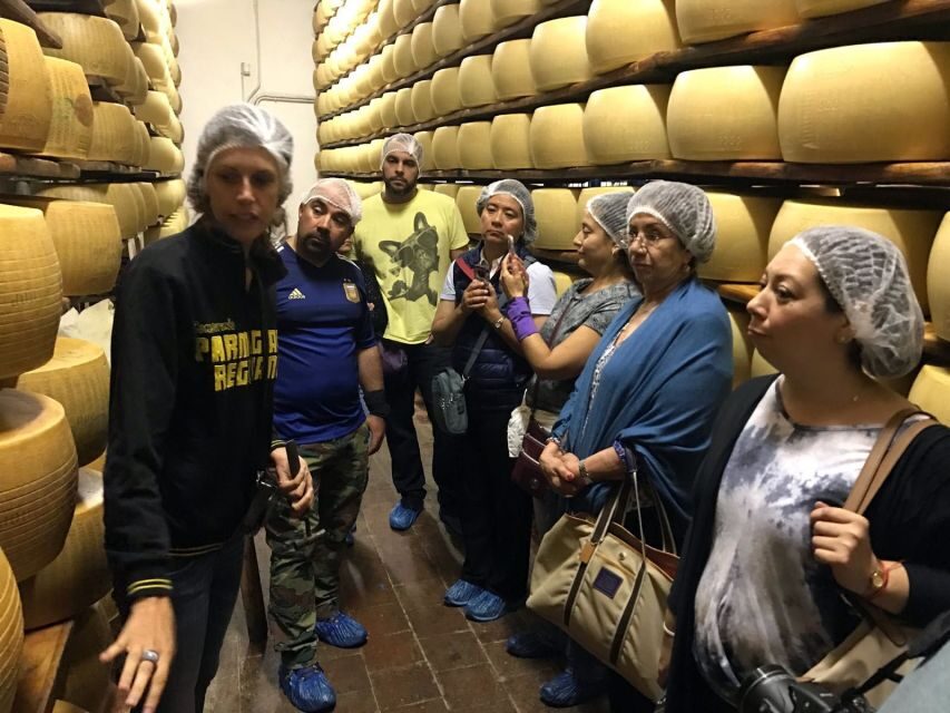 From Bologna: Parma Cheese & Ham Factory Tours and Tastings - Parma ham at the factory: selecting legs, learning sugnatura, and tasting with wine